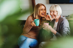 A mother talking to her adult daughter.