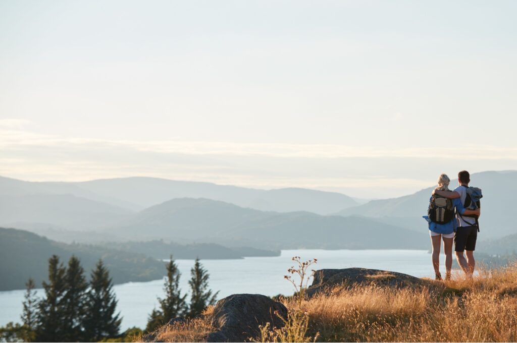 A couple hiking in the Lake District.